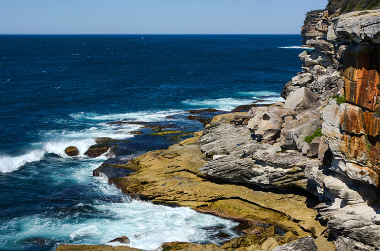 Trecherous waters around the the rocky cliffs of Lady Bay at South Head.