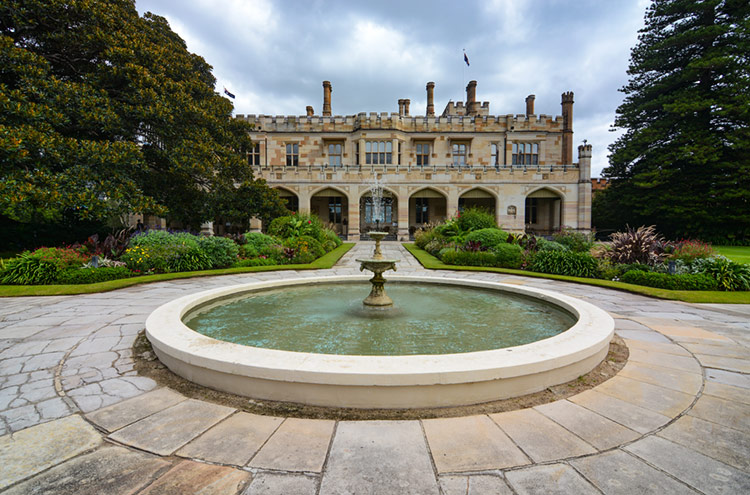 Castle-like Sydney Government House and garden grounds.