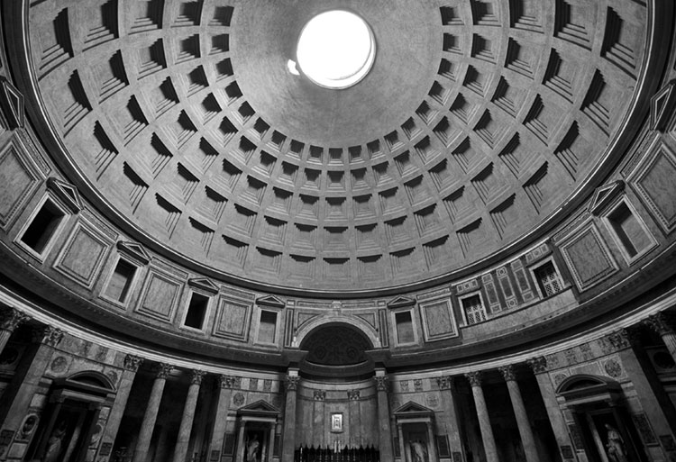 Black and white of the impressive interior of the Roman Pantheon.