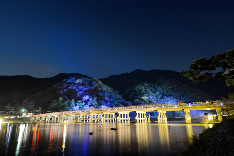 Togetsu Bridge reflecting in the Katsura River during the Arashiyama Hanatouro.