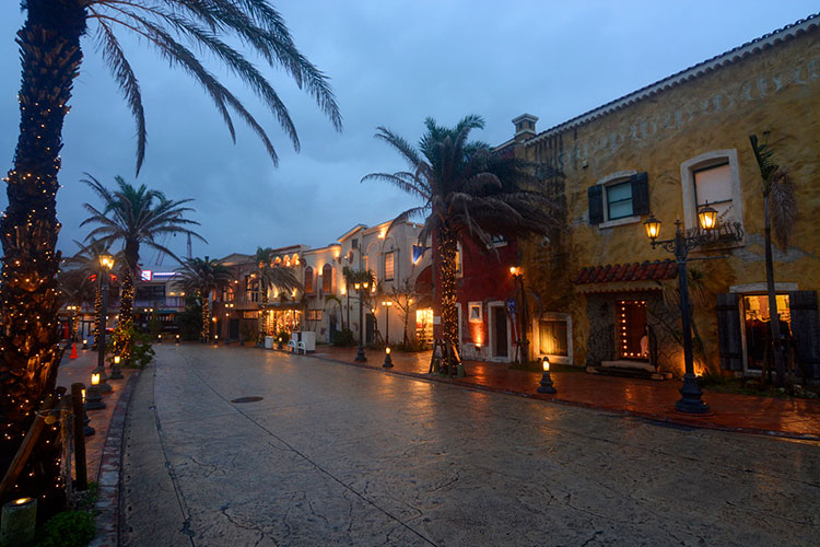 Evening lighting along the road through Mihama American Village.