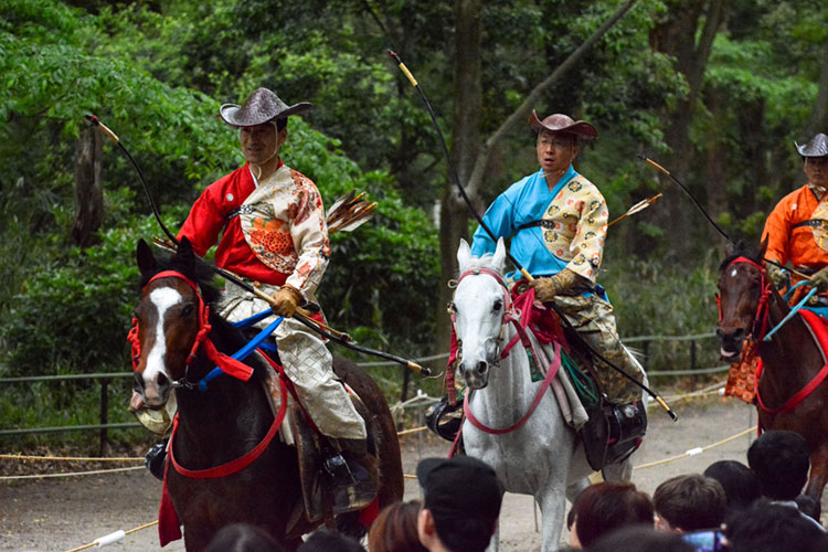 Yabusame Shinji archers presenting themselves to onlookers at Shimogamo Shrine.
