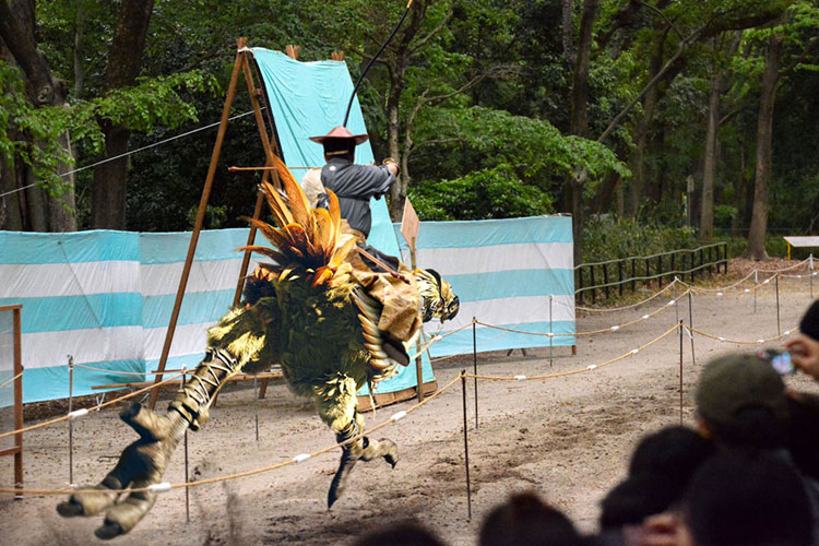 Archer taking aim while riding a chocobo.