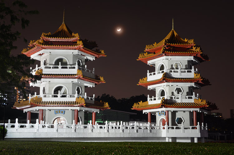 Chinese Garden Twin Pagodas moonshot at night.