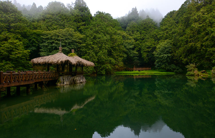 Peaceful mountain pond known as Elder Sister Pond, in Alishan National Scenic Area.